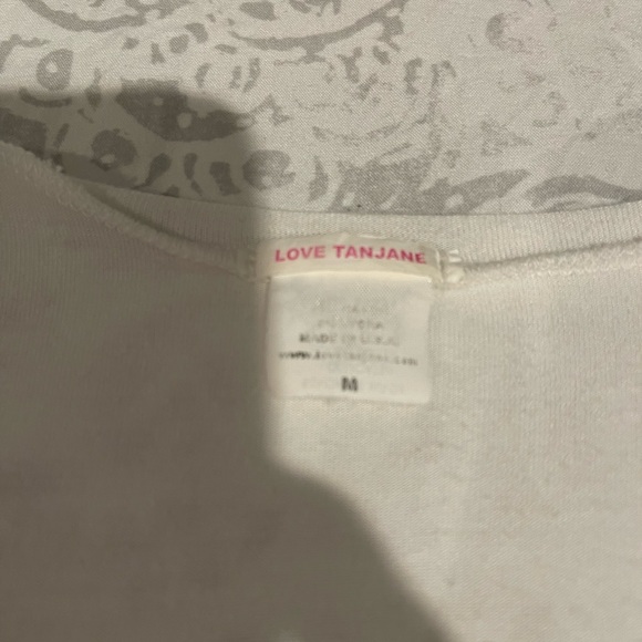 White tank top by love tan Jane. Mint condition. Coton size medium. - Picture 3 of 3